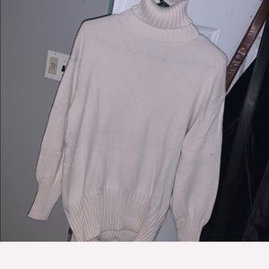 Women’s oversized turtle neck sweater